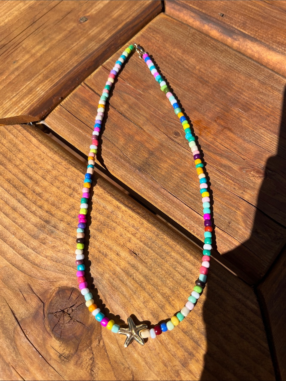 Gold starfish colourful handmade beaded necklace
